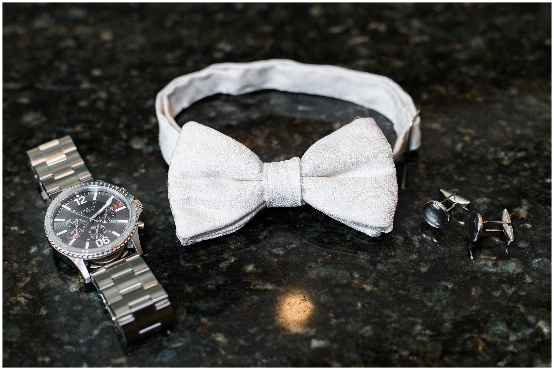 mens watch, cuff links, grooms watch, grooms details, grooms details, white bow tie, grooms bow tie, bow tie and shoes, shiny wedding shoes, grooms wedding shoes, black and white wedding photo, coral boutineer, grooms boutineer, coral and blue wedding